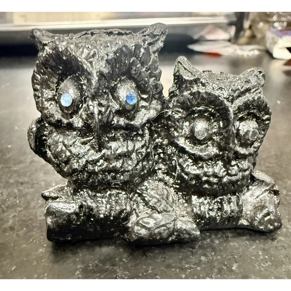 A Pair of Owls with Red Rhinestone Eyes Hand Crafted from Coal